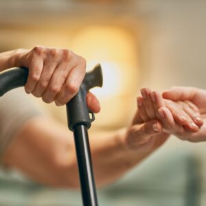 Elder Law Attorney - Person holding an elderly person's hand
